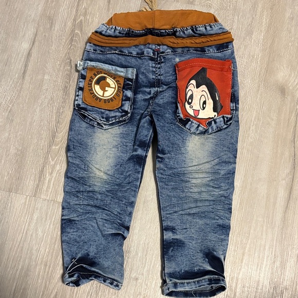 Stylish Blue Jeans with Brown Accents - Picture 2 of 3